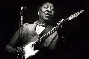 Muddy Waters playing guitar